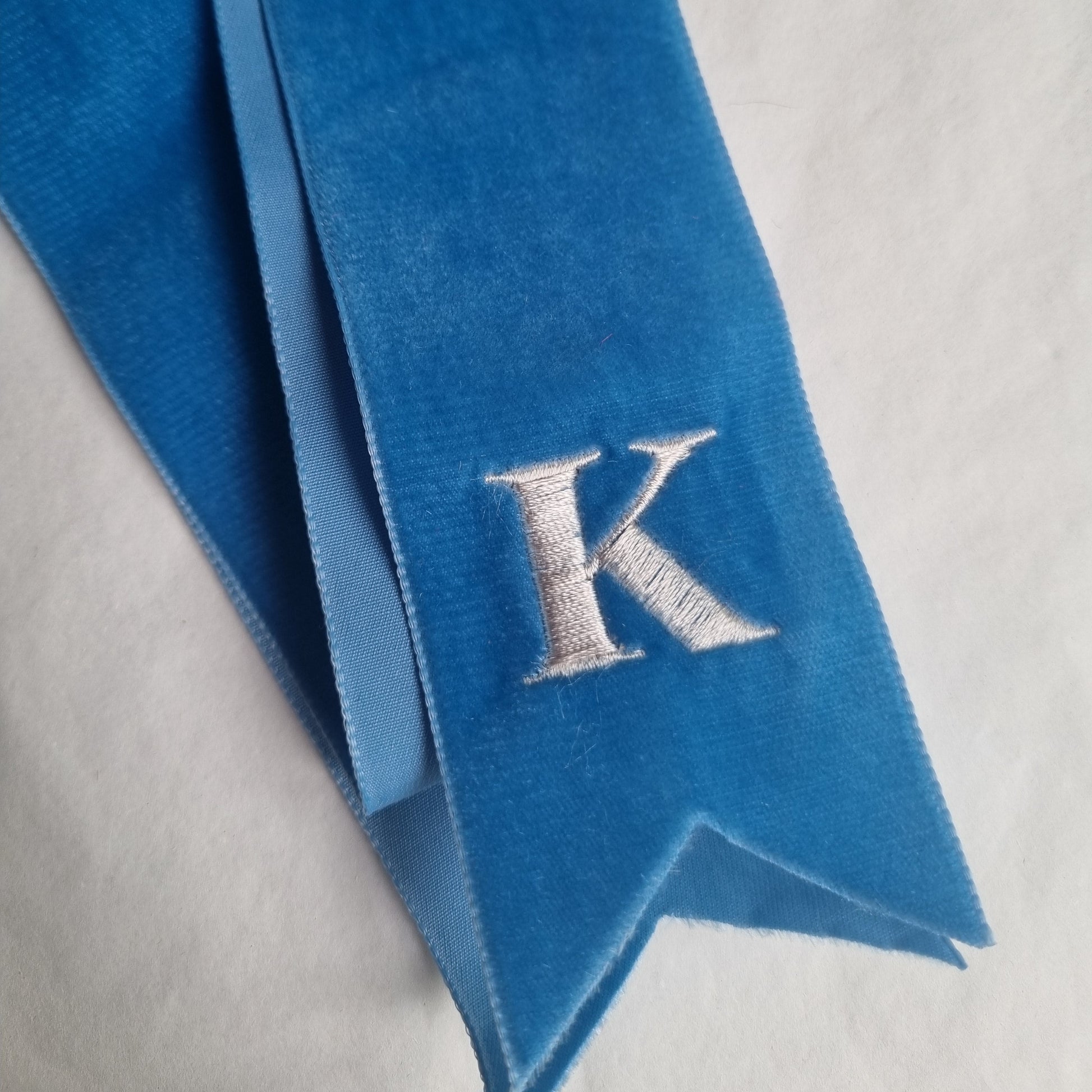 Blue Velvet Ribbon with a K embroidered on it