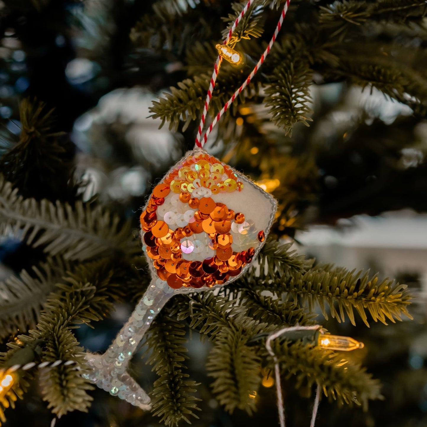 A Summer Spritz in a Glass ornament, sequinned on a tree