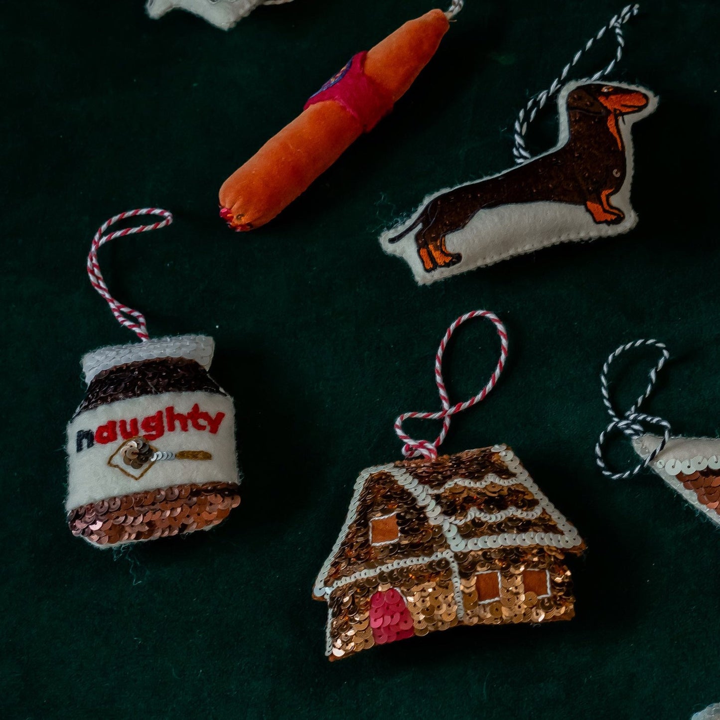 Naughty Spread ornament with brown sequinned ornaments