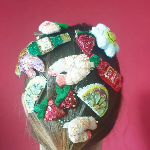 Handmade Sequin Hair Clips, covering Kate's head