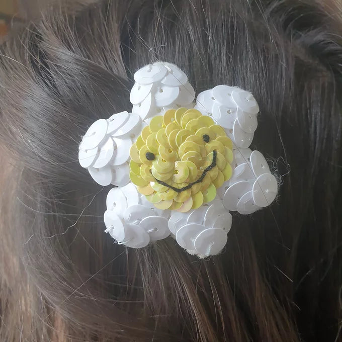 Smiley Daisy Hair Clip in hair