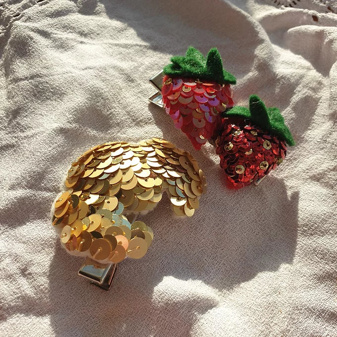 The Croissant Hair Clip, The Jinny, a sequinned croissant hair clip