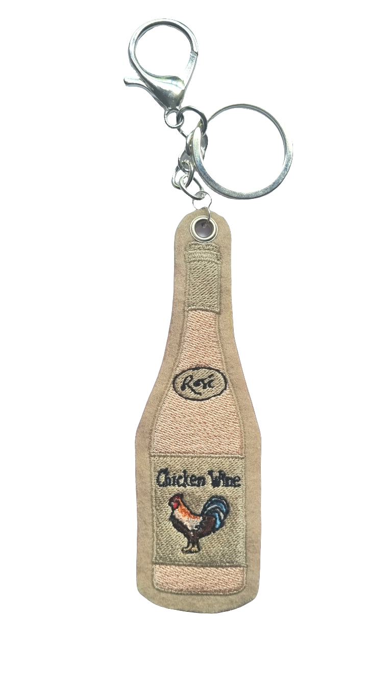 Embroidered rose wine bottle handbag charm with Chicken Wine on the label