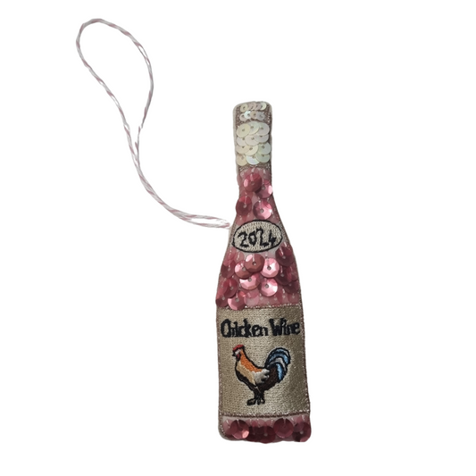 A sequinned Chicken Wine Ornament cutout