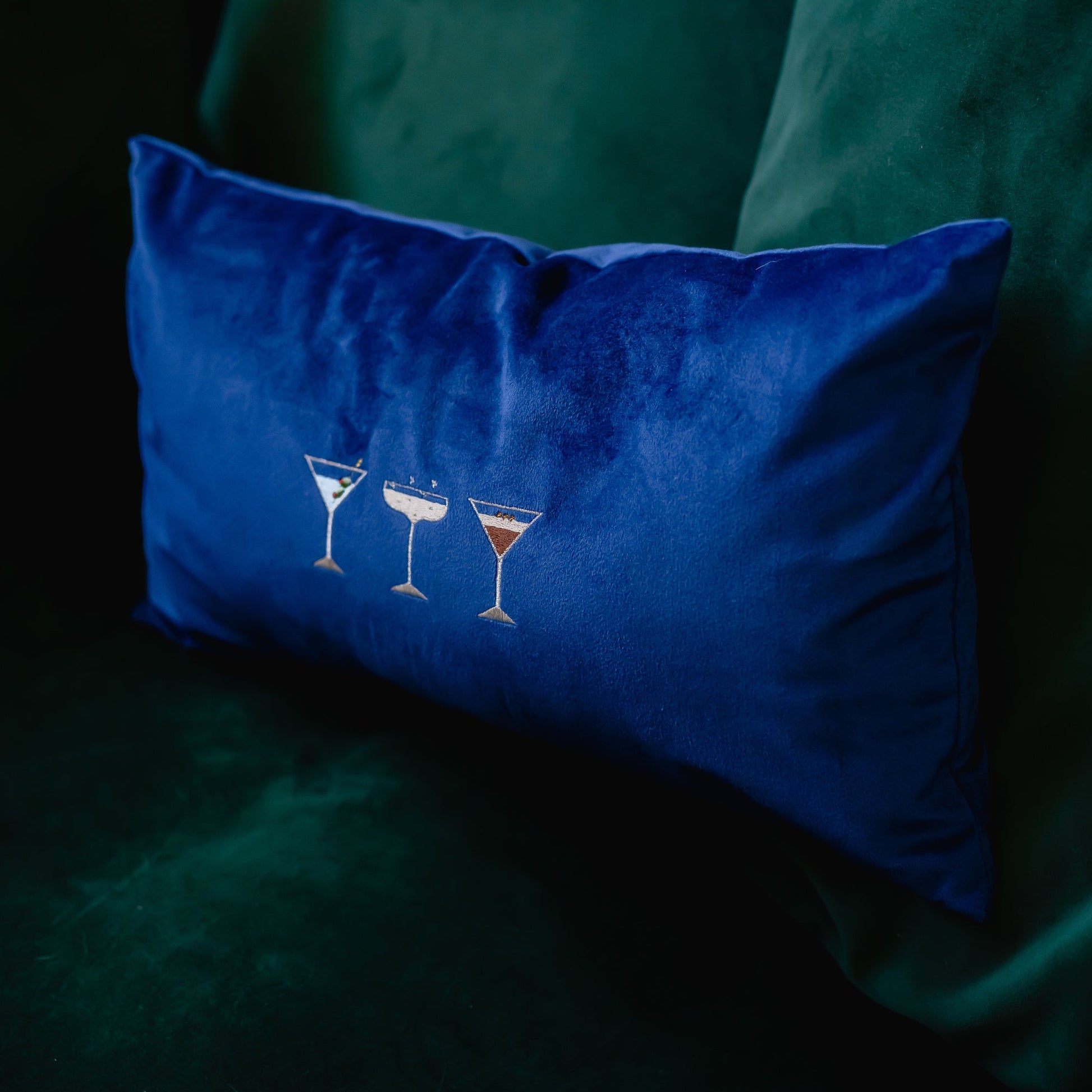 the navy cocktail cushion with kate gwilliam embroidered cocktail motifs