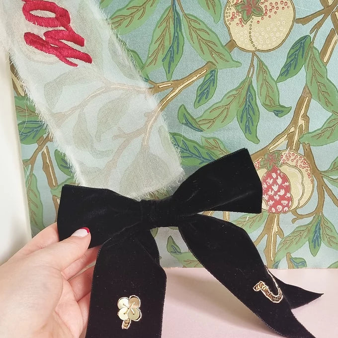 Lucky Charm Bow, black velvet bow with a golden four leaf clover and golden horseshoe
