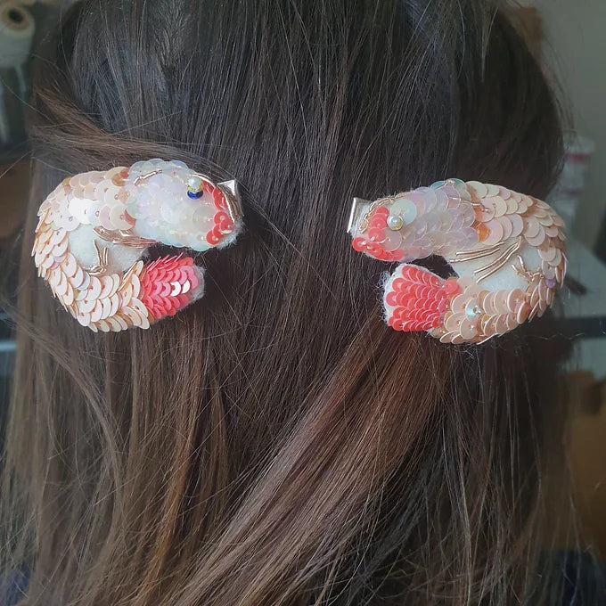 sequin prawn hair clips in hair