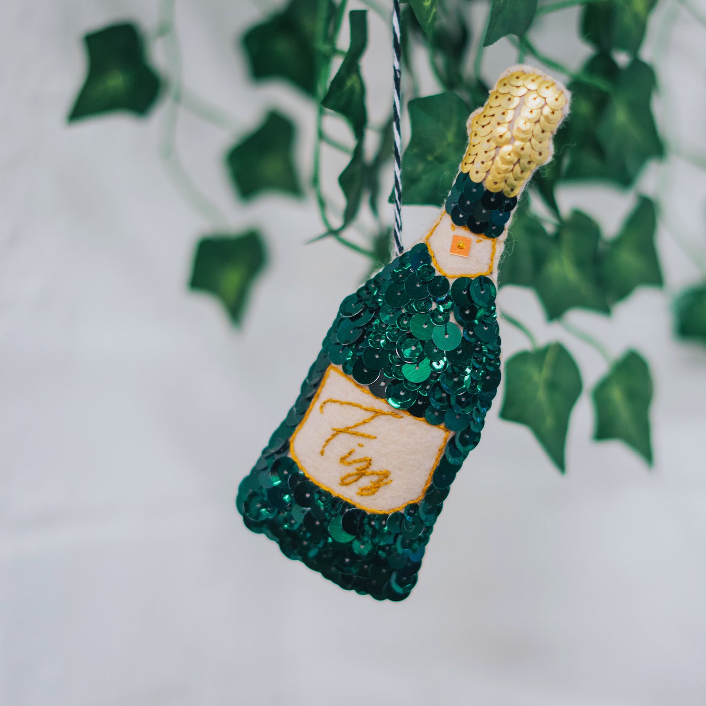 Fizz Champagne Sequin Ornament Handmade. Green sequinned champagne bottle ornament