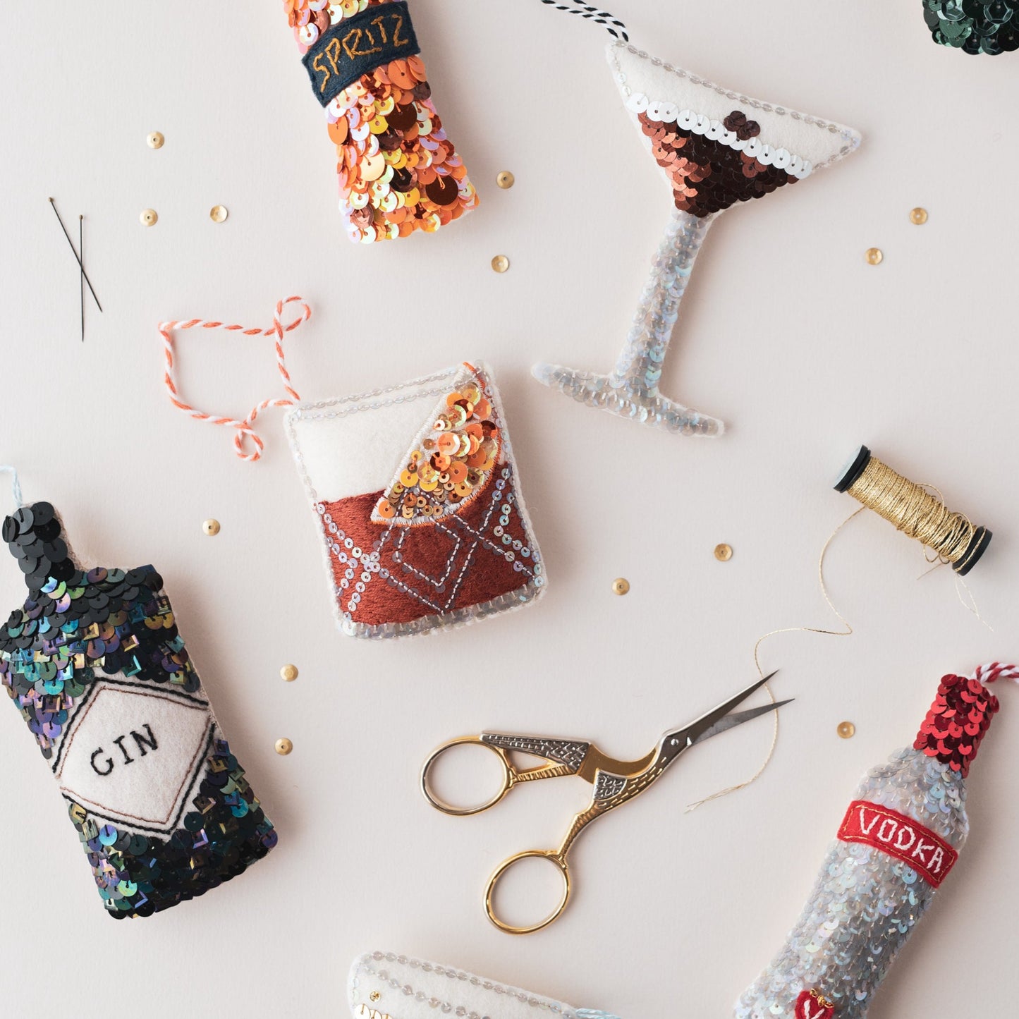 a collection of sequin ornaments including the negroni