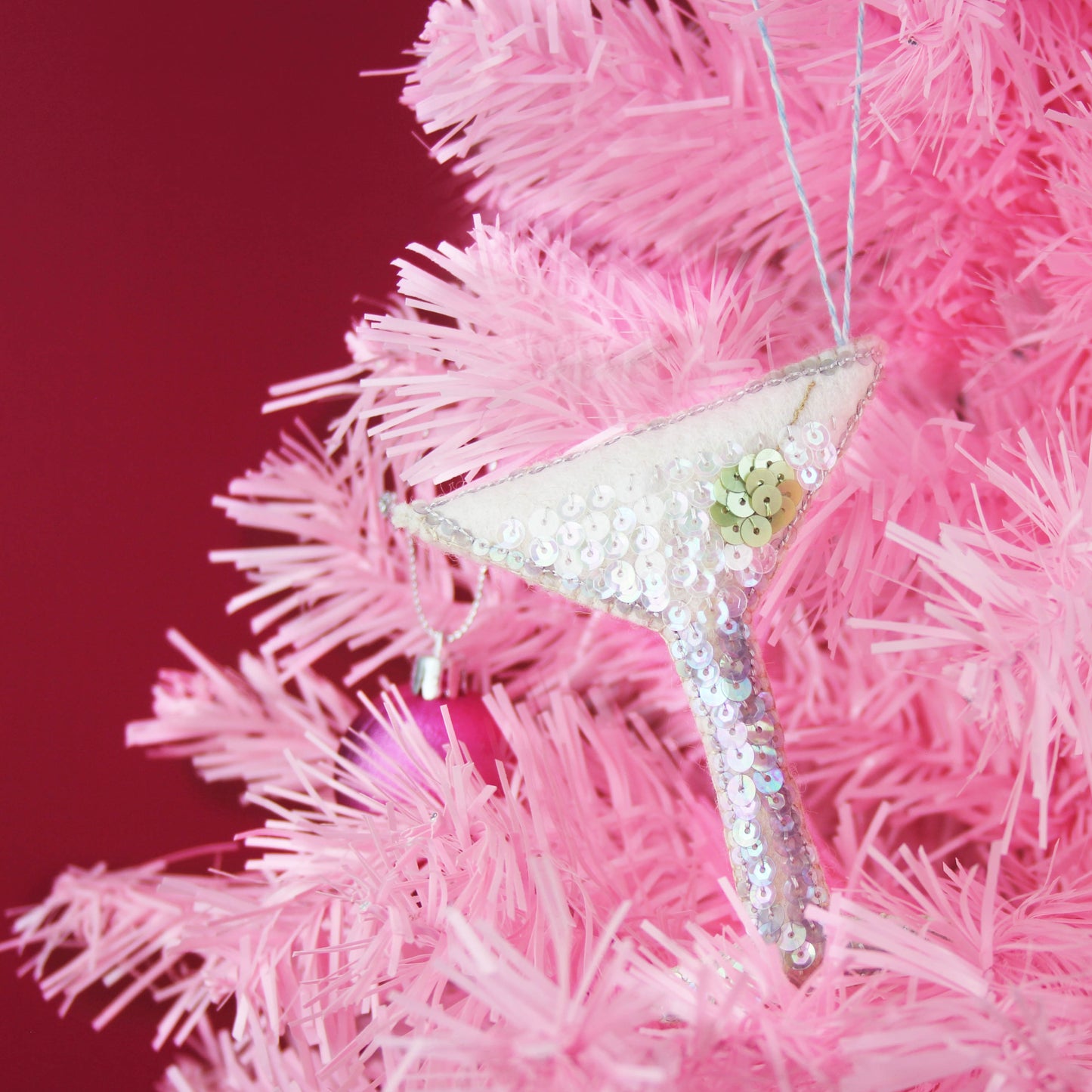 Handmade Cocktail Sequin Ornament on a pink tree