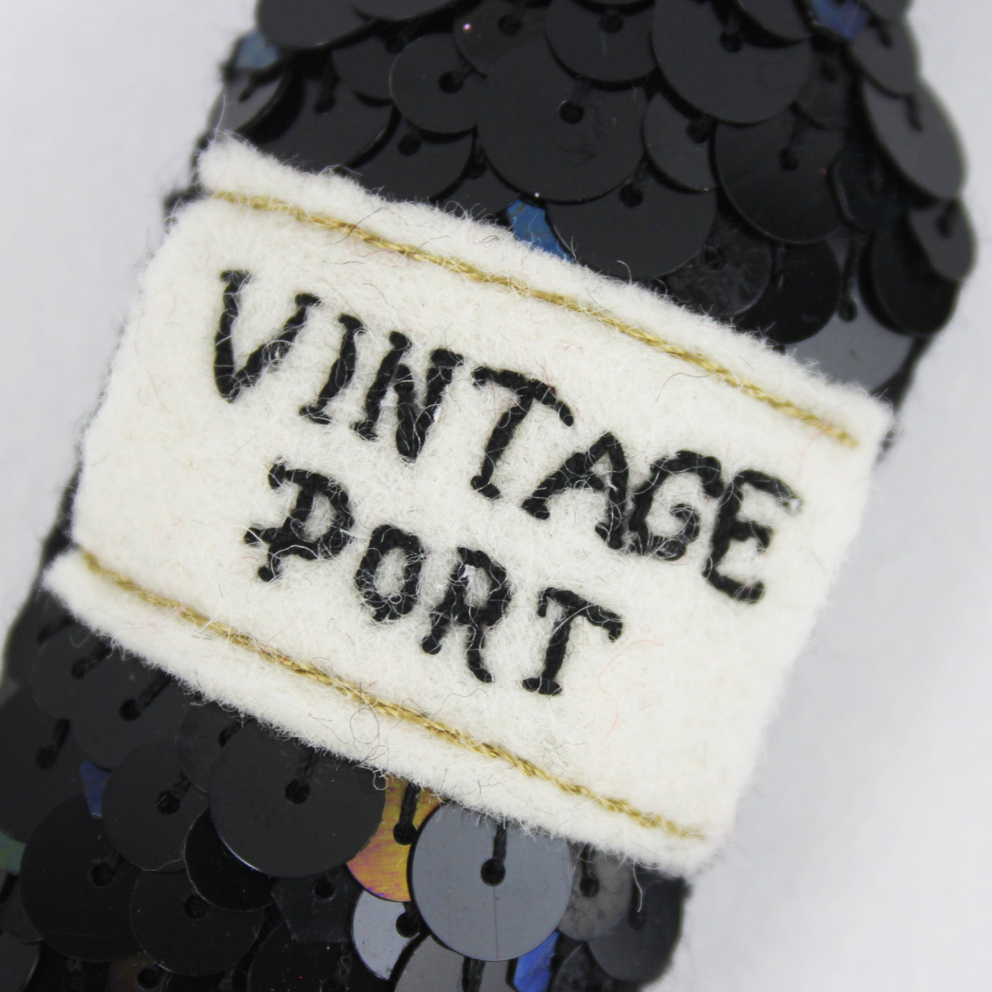 Vintage Port Hanging Ornament close up of the embroidered label
